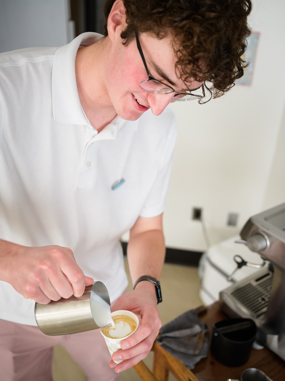 Brendon pouring latte art
